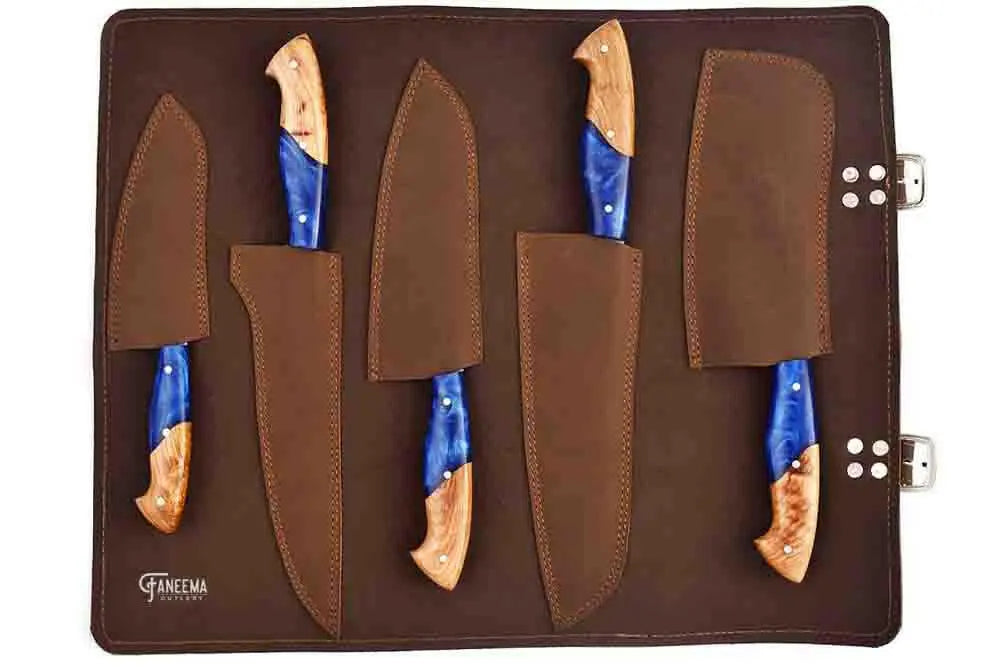 Faneema Cutlery kitchen knife set with artisan forged chef knives featuring blue and wooden handles in a brown leather case