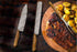 Faneema Cutlery BBQ set with steak knives and grilled meat on wooden board best knife set for barbecue