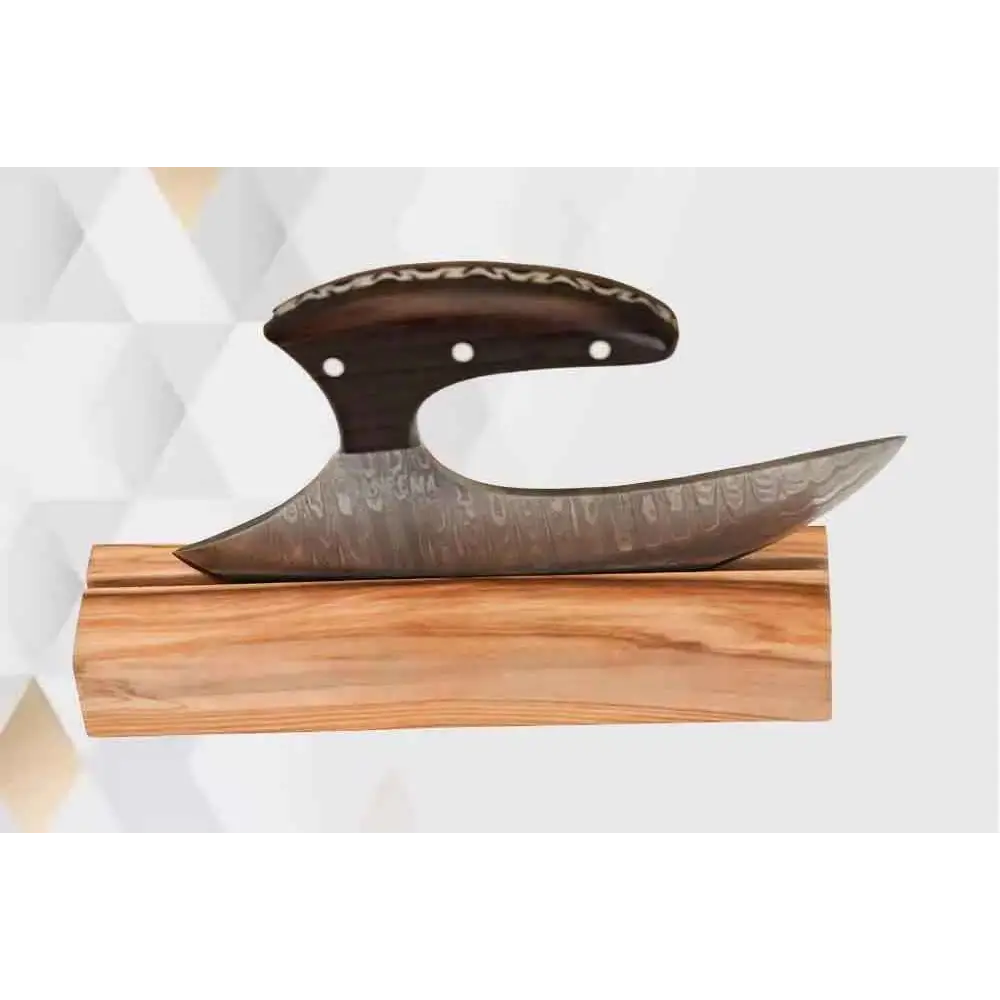 Black handle Damascus ulu chopping knife on wood block