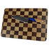 Sleek chef knife with blue handle on lena checker cutting board