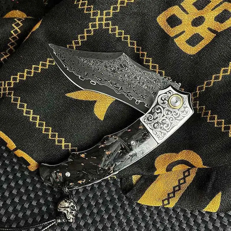 Black and silver Damascus stylish knife with skull pendant carbon fiber handle