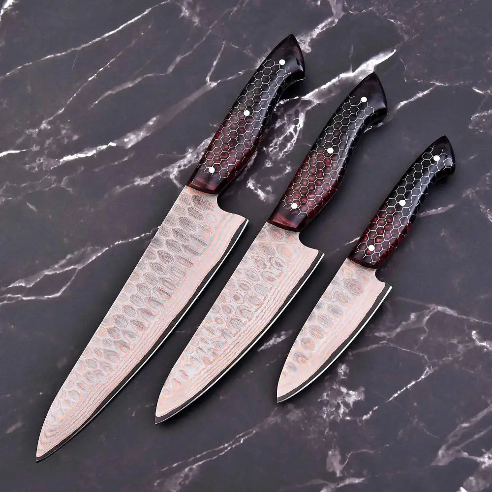 Damascus honeycomb knife set with hexagonal handles and leather sheath
