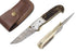 Faneema Cutlery Damascus pocket knife with detailed patterned blade and leather sheath