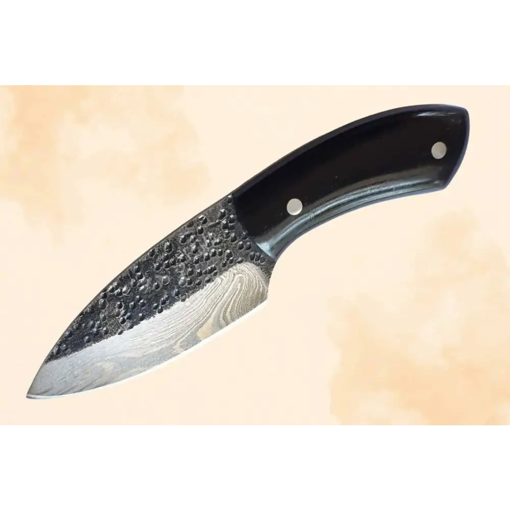 Damascus steel outdoor bubalus skinner knife with black handle and hammered wavy blade