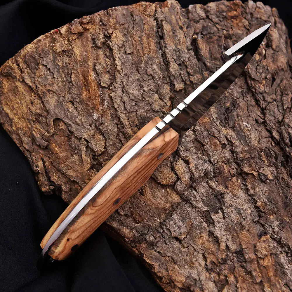 Sleek gut hook knife with polished steel blade and wooden handle
